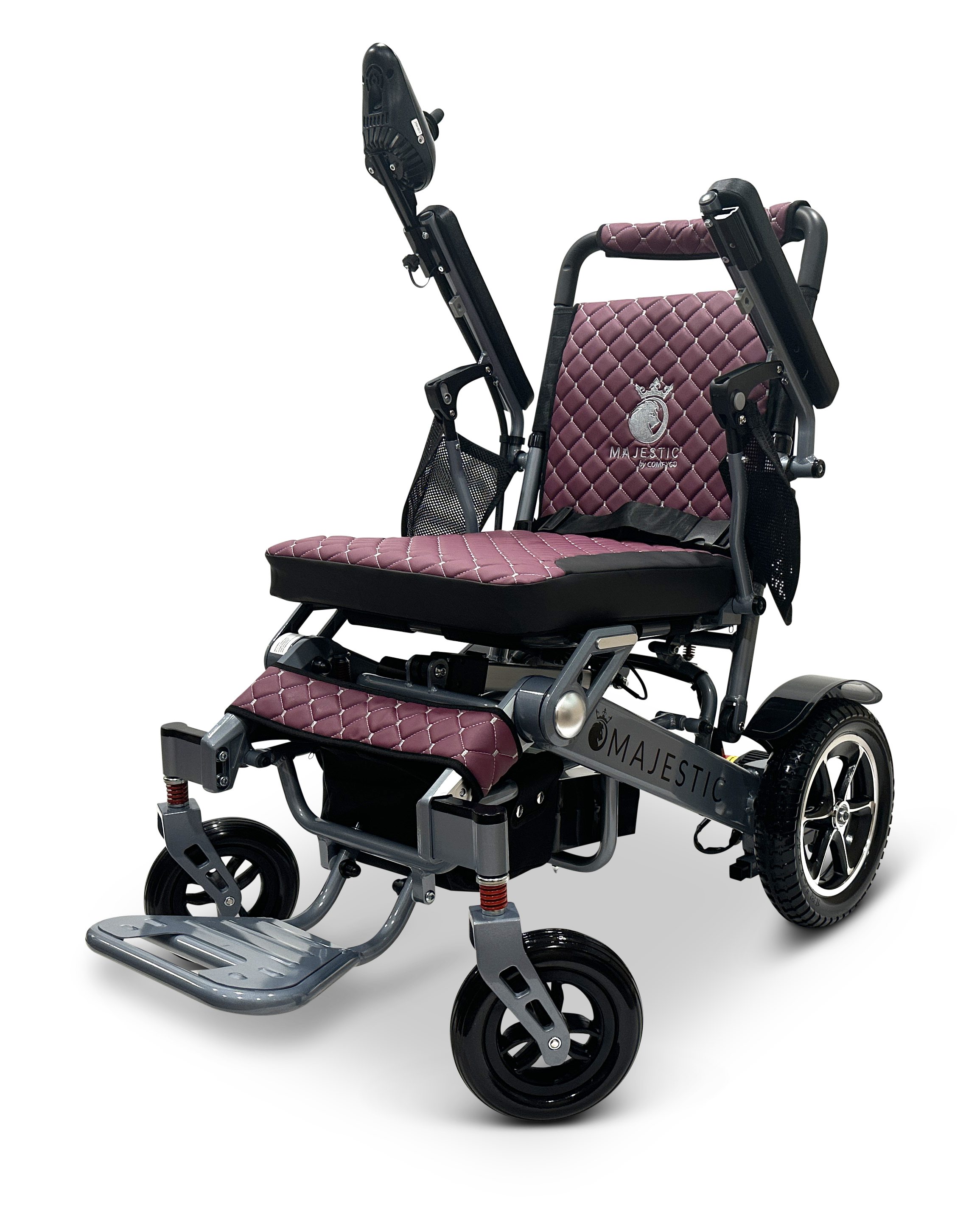 The MAJESTIC IQ-7000 Auto Folding Electric Wheelchair features a maroon, quilted seat and backrest, foldable footrest, large rear wheels, smaller front wheels, and the Majestic brand on the side. Effortless navigation is provided by its 360-degree joystick control.